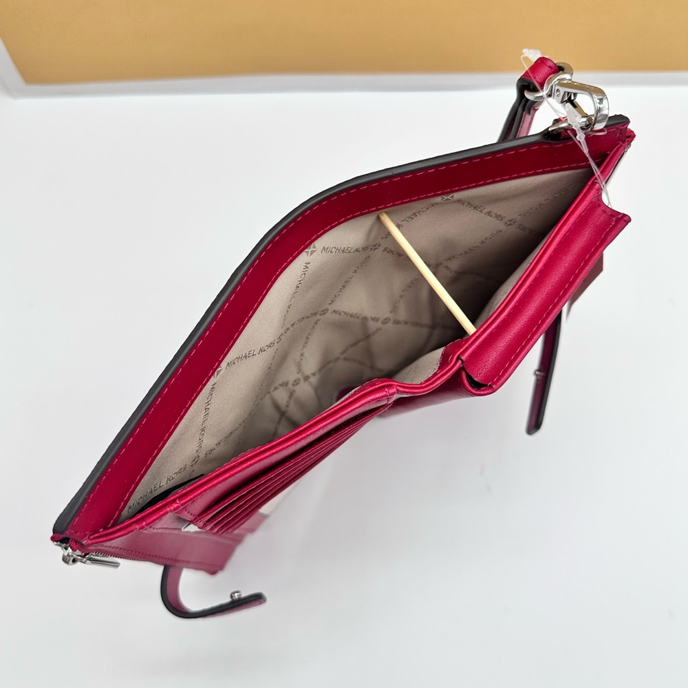 MICHAEL KORS
Jet Set Large Ombré Logo Wristlet Dark Raspberry color - Picture 14 of 15